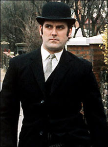 John Cleese John Cleese in a bowler